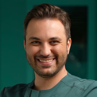 Dt. Erdoğan Ertek - Diş Hekimi