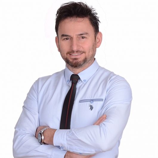 Dt. Zafer Küreğibüyük - Diş Hekimi
